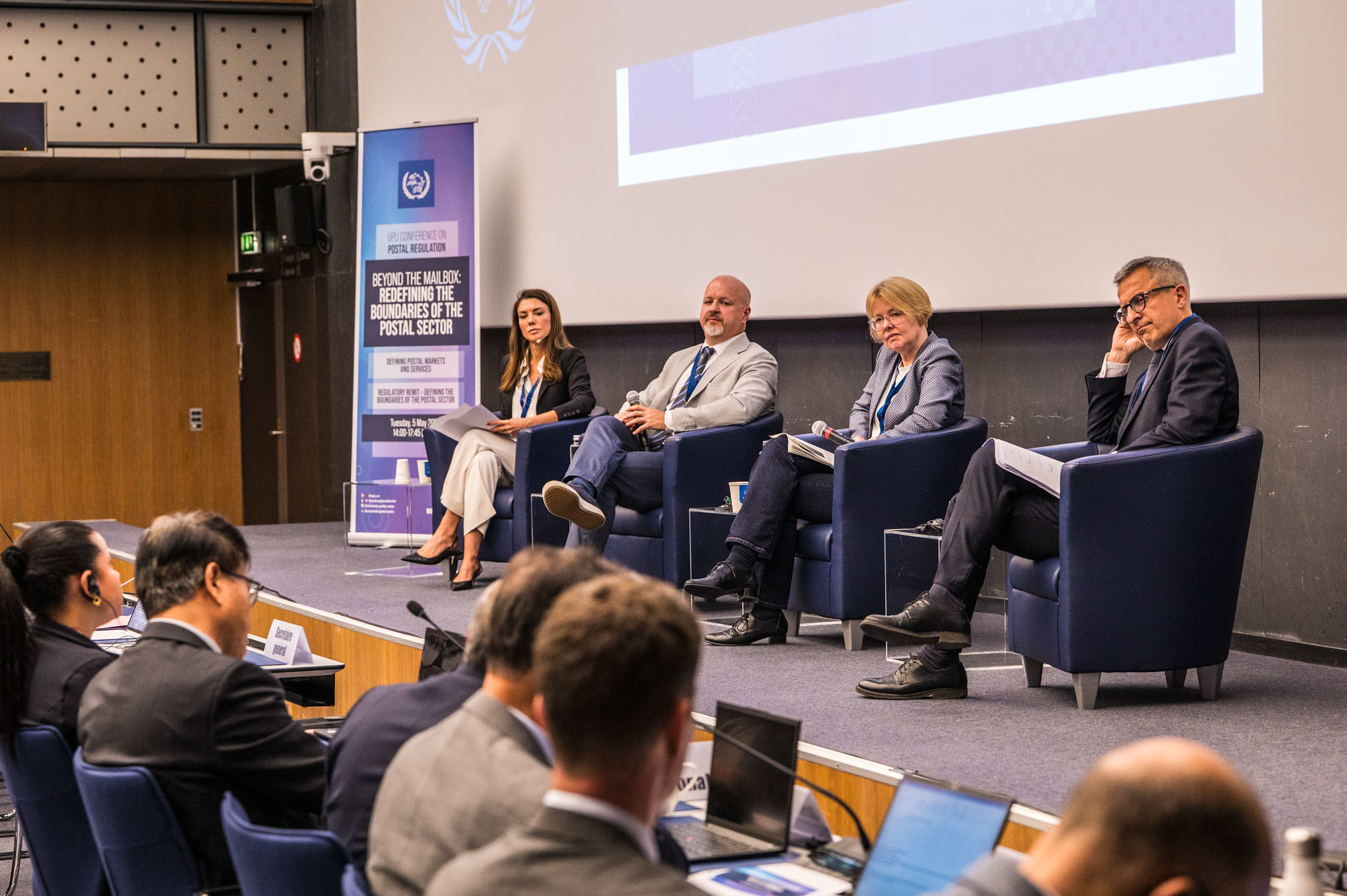 Regulatory experts advocate customer focus in postal policymaking